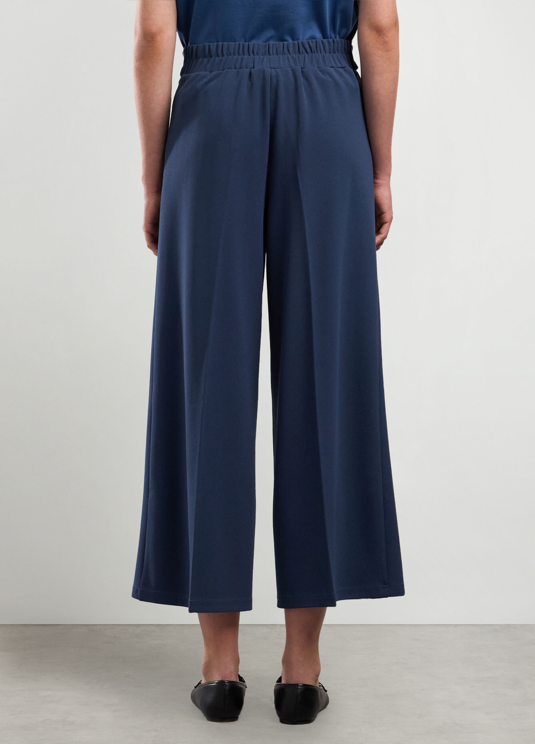 Pantaloni palazzo in tessuto stretch con cintura donna_1